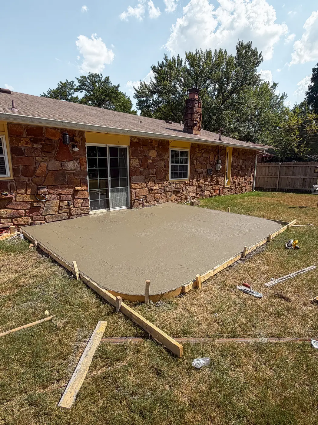 Freshly poured backyard concrete patio