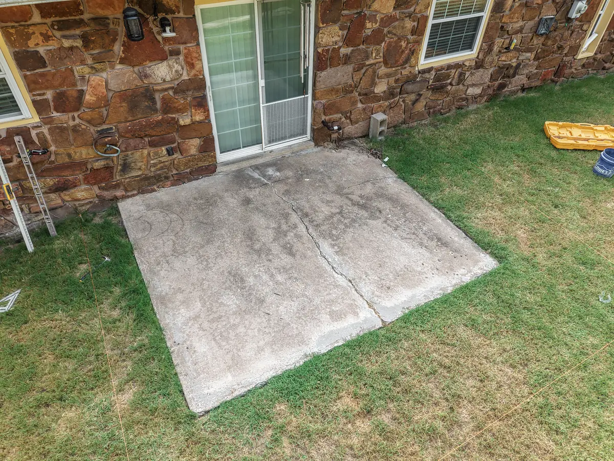 Aerial view of an existing concrete patio before tear-out