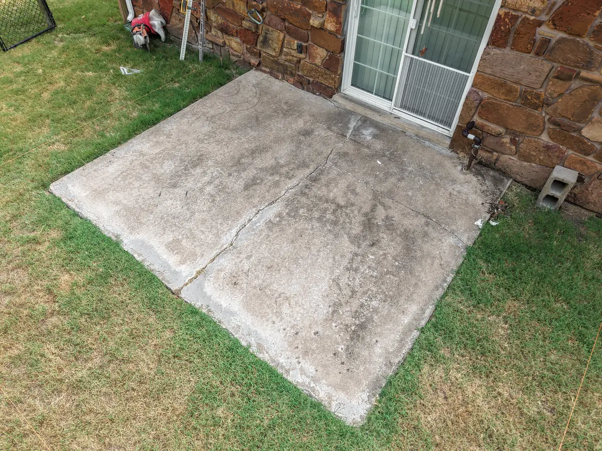 Existing cracked concrete patio before tear-out