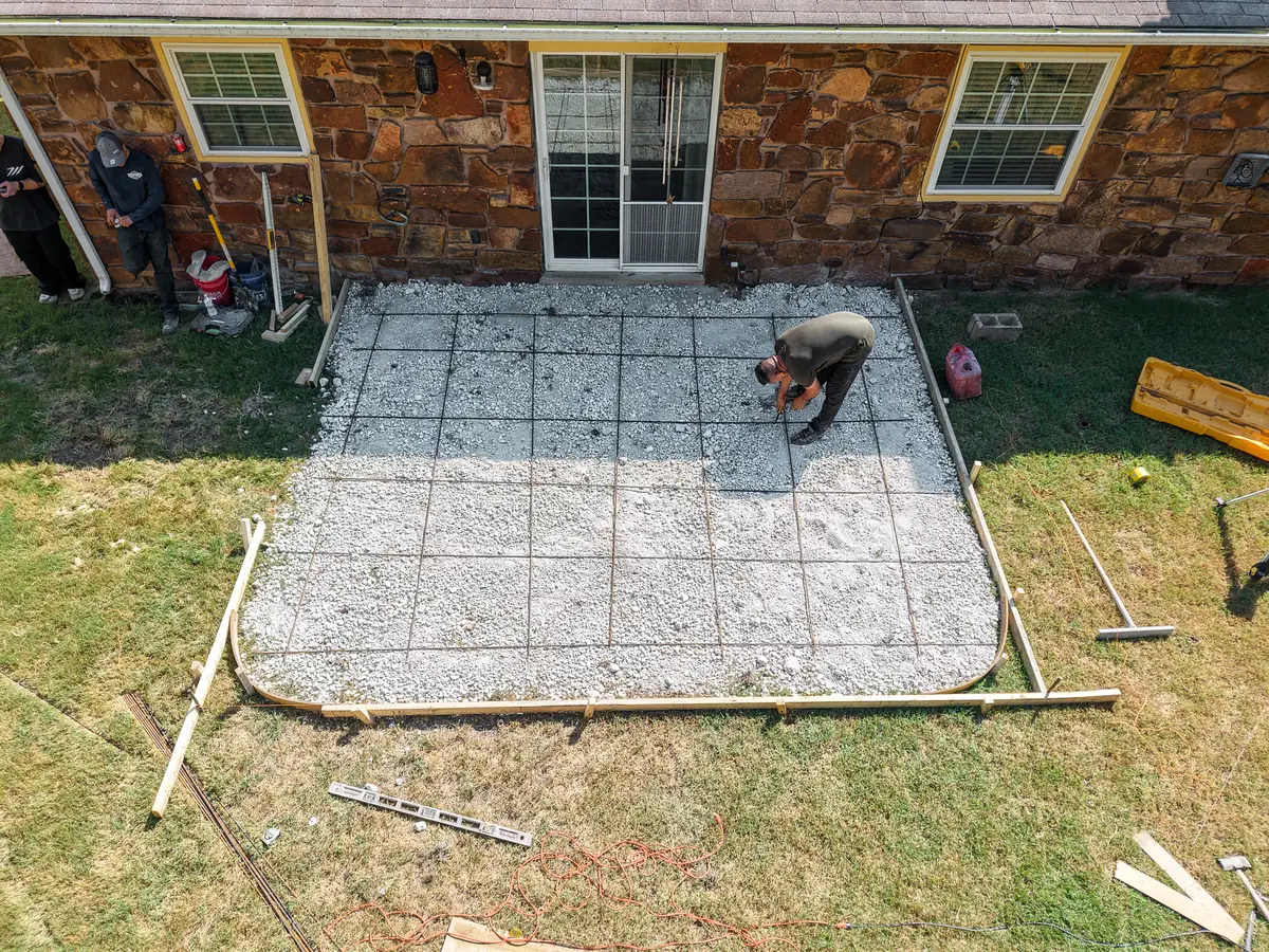 Aerial view of patio forms and rebar grid over a gravel base