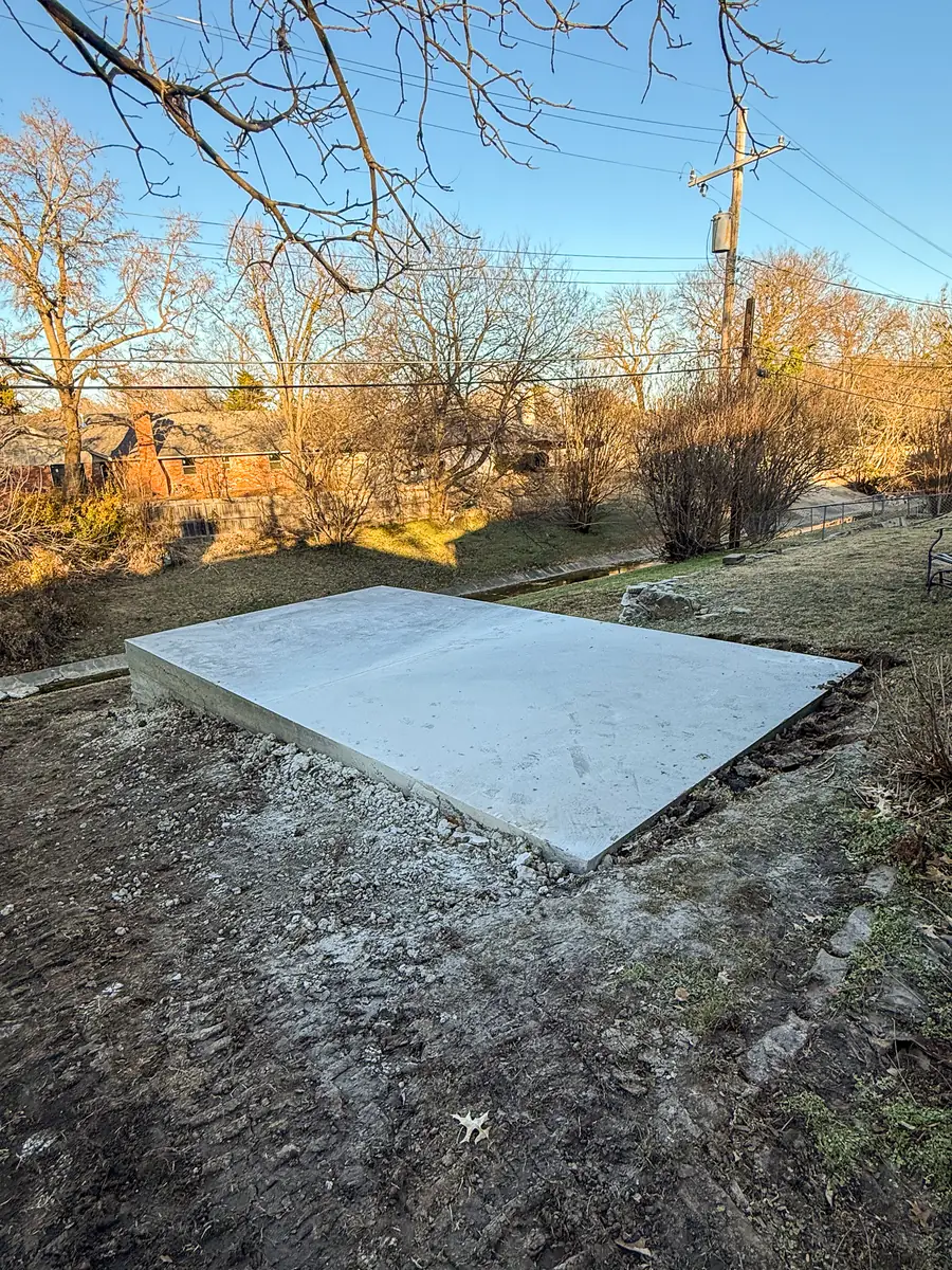 Concrete slab pad poured in a backyard lot