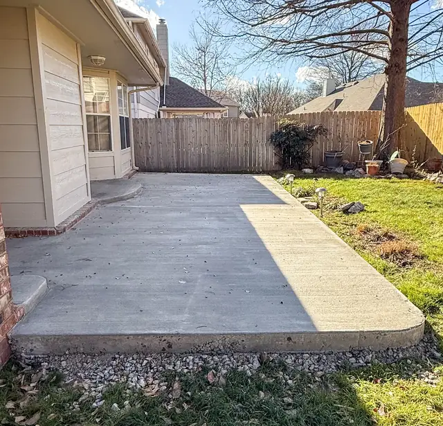 Finished concrete patio extension with clean formed edges