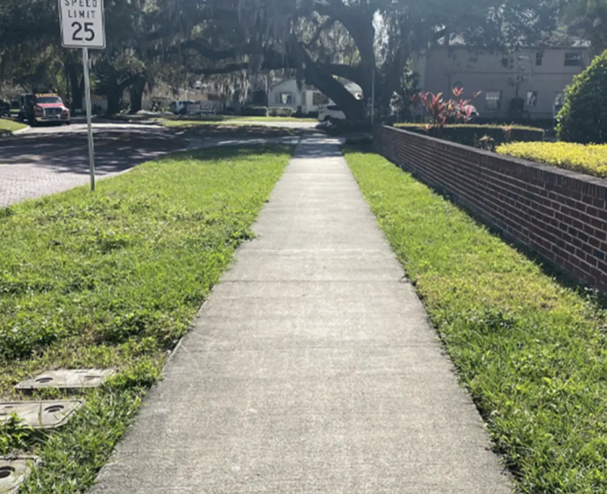 Concrete sidewalk along a neighborhood street